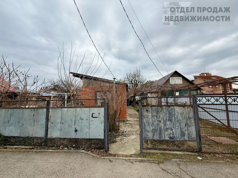 Участок с жилой пристройкой