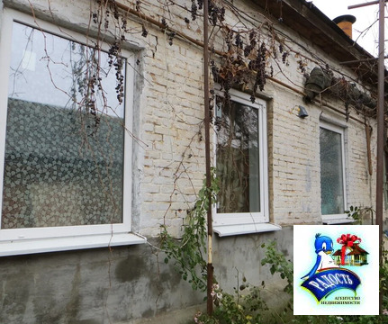 Продам часть дома с времянкой в центре города.