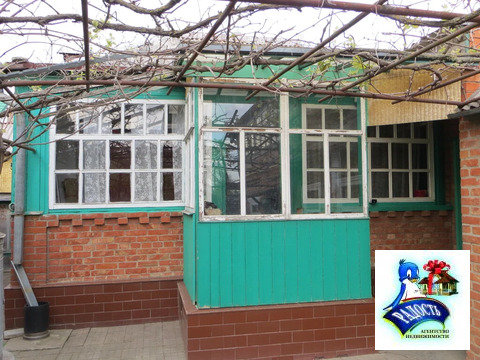 Продам дом в центре города на тихой улице.